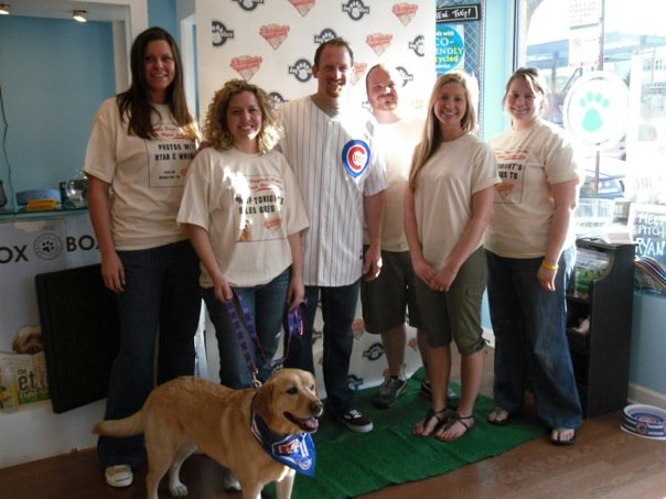 Candace D'agnolo standing with dog and other pet business owners